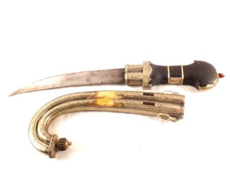 A large ceremonial Janbiyya/Khanjar, complete with its white metal embellished scabbard, 28" overall with a 15" blade