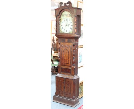 An early 19th Century oak and mahogany longcase clock, with swan neck and turned pillars to the hood, fitted a painted arch d