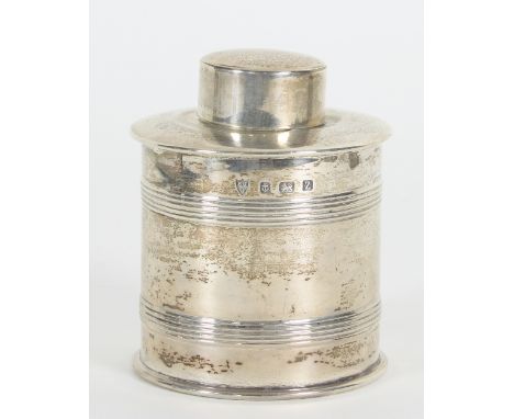 A cylindrical silver tea caddy, EJG, Birmingham 1924, with cover and thread borders, 9cm high