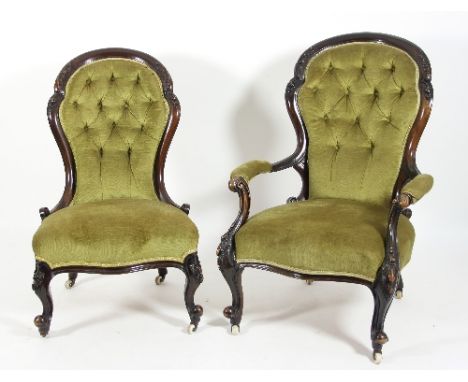 A Victorian walnut armchair with green velvet upholstered button back, padded seat and arms, together with a matching side ch