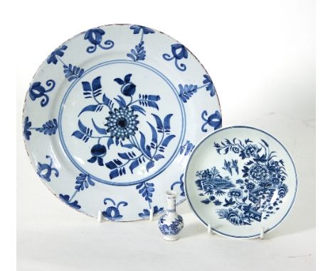 A Delft plate decorated with floral sprays, 22cm diameter, a Worcester fence pattern dish and a miniature Chinese blue and wh