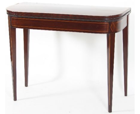 A Georgian mahogany D-shaped card table with inlaid frieze on square taper legs with spade feet, 90.5cm wide