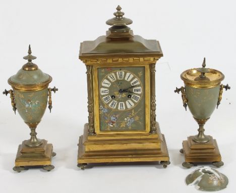 A 19th Century French gilt metal and japanned clock garniture, John Hall & Co., Paris, the ceramic dial painted with enamel d