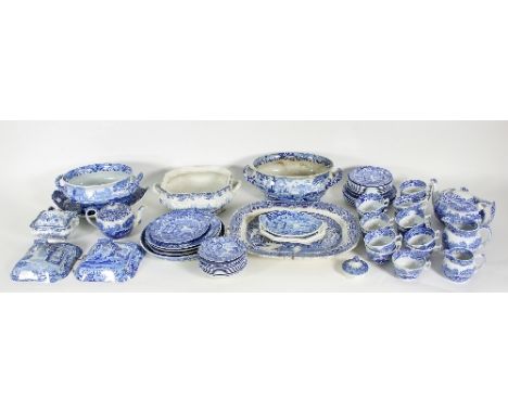 A large quantity of blue and white transfer dinner wares, mainly Spode, comprising two large oval tureens, a large meat platt