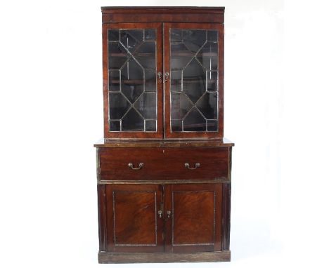 A 19th Century mahogany secretaire bookcase, the top section with astragal glazed doors above a lower section with drop-down 