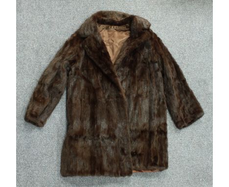 A fur coat, five fur stoles and a pair of fur gloves