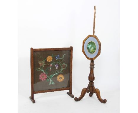 A Victorian pole screen on a tripod support and a needlework firescreen
