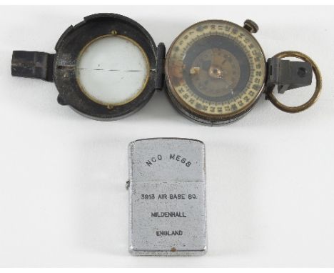 A cigarette lighter inscribed 'NCO Mess 3913 Air Base Sq., Mildenhall, England' and with enamel badge 'Strategic Air Command'