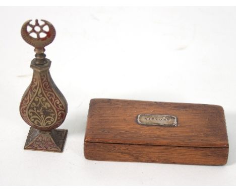 A 19th Century oak snuff box, the cover with plaque named 'Victory', the box thought to have been made from part of the mast 