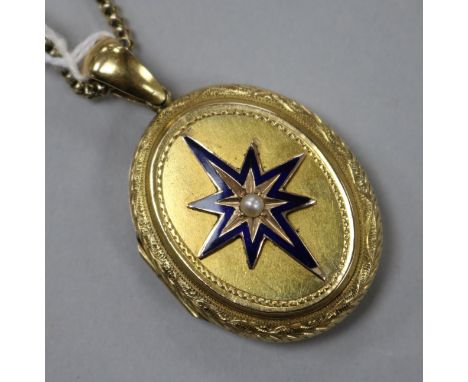 A Victorian yellow metal, enamel and seed pearl oval locket on chain, locket 48mm.