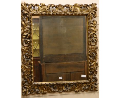 A 19th century Florentine style gilt acanthus carved wall mirror W.89cm