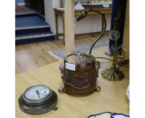 A carved biscuit box, 2 lamps and a Cornish stone barometer