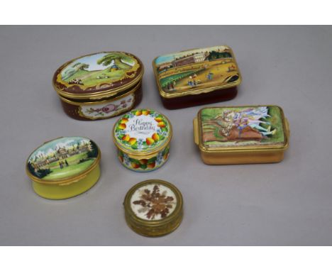 A small collection of enamel patch boxes and other boxes