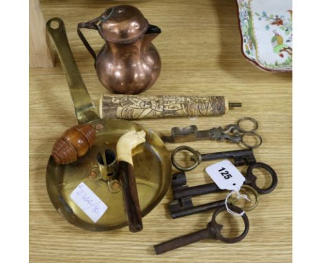 Brass covered jug, cased pipe, coquilla nut grater, four keys, scissor style candle snuffers and a brass candlestick