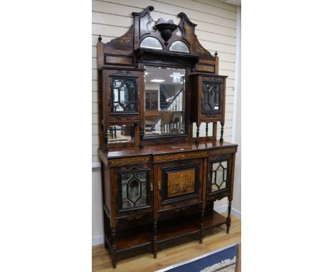 A rosewood cabinet with mirror