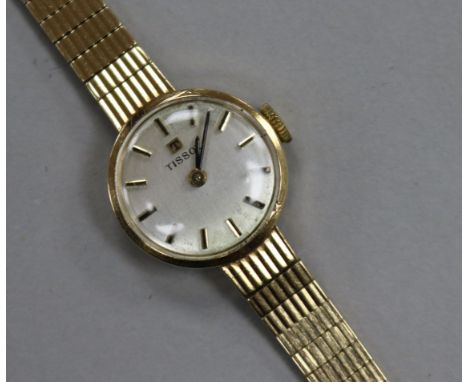 A lady's 9ct Tissot manual wind wrist watch.