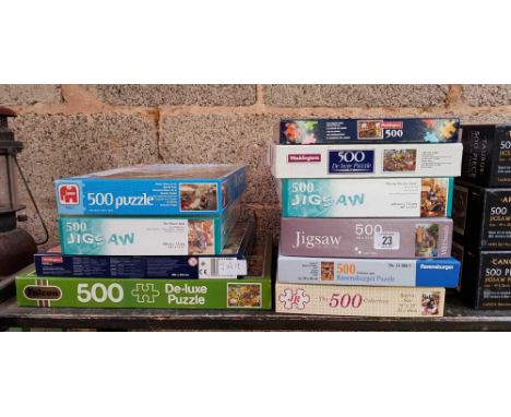 SHELF OF MISC JIGSAW PUZZLES