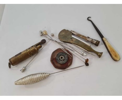 VARIOUS STICK PINS, AN OLD BRASS LIGHTER ETC & A BRASS TAMPER ETC