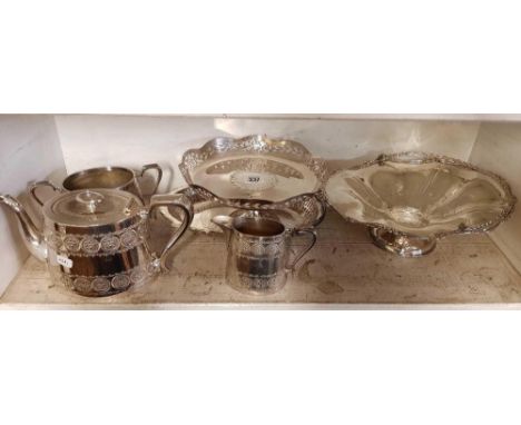 SHELF WITH MIXED PLATED WARE INCL; SWING HANDLED BASKET & TEA POT