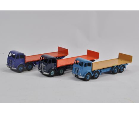 Trio of Dinky No. 903 Foden (2nd Type) Flat Truck with Tailboard. Includes Dark Blue / Orange, Light Blue / Tan and Blue / Or
