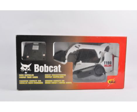 Large Scale Remote Control Bobcat. Untested but appears Mint in Excellent Box.