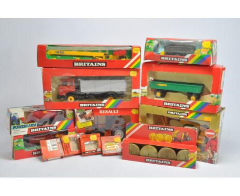 Large Britains Tractor and Implement Group including Various issues. Generally Very Good to Near Mint in Good Boxes. (13)
