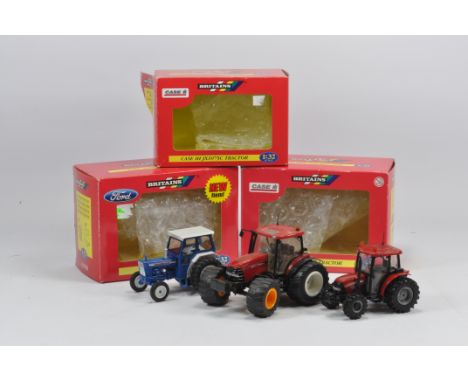 Trio of Britains Tractor Models including a couple of conversions. Case and Ford etc. Near Mint with boxes. (3)