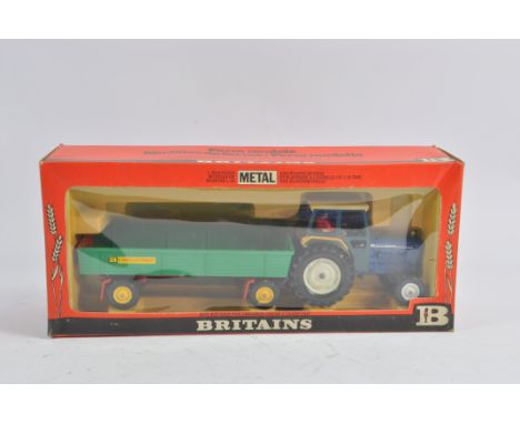Britains Farm No. 9597 Ford 6600 Tractor and Trailer Set. Very Good to Mint in Very Good Box.