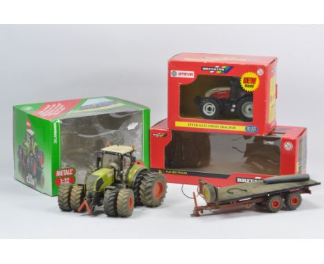 Siku Claas Tractor with dual wheels (Modified) plus Britains Steyr and finely modified Britains Flatbed Trailer. Near Mint wi