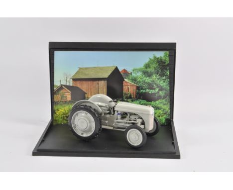 Ertl 1/16 Scale Ford 9N with Ferguson System Precision Series Tractor. Mint in Excellent Display Box.