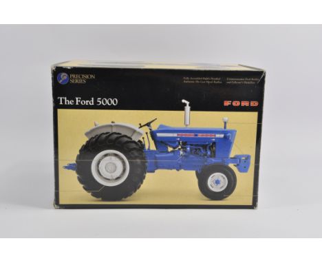 Ertl 1/16 Scale Ford 5000 Precision Series Tractor. Mint in Excellent Box.