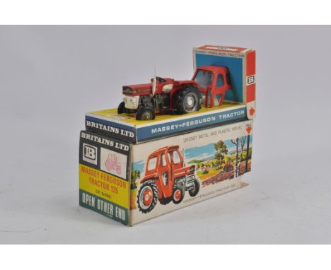 Britains Farm No. 9529 Massey Ferguson 135 Tractor. Decals faded but generally Very Good to Excellent in Excellent Box. 