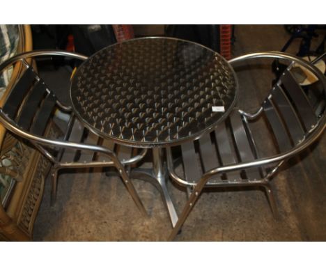 A METAL GARDEN TABLE AND CHAIRS