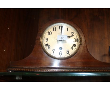 A NAPOLEAN HAT MANTLE CLOCK MARKED 'TREE' - 121, DOVER STREET, LONDON