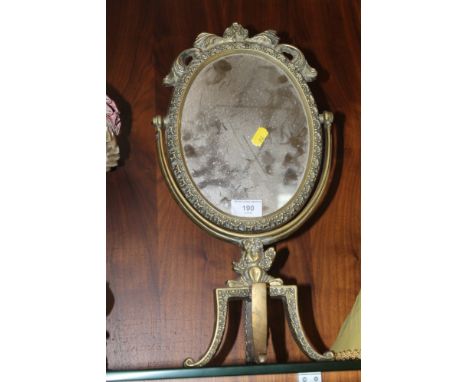 A BRASS DRESSING TABLE MIRROR