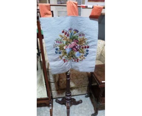 A Victorian walnut and gilt brass polescreen with tapestry banner (Worm)