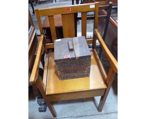 A small oak box with printed mark Cheltenham Brewery and a commode chair