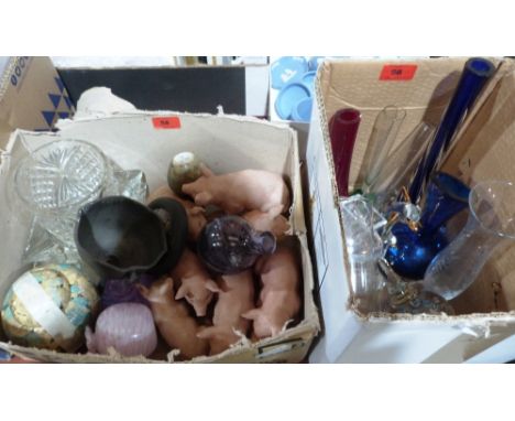 Two boxes of glassware, ceramic pigs etc.