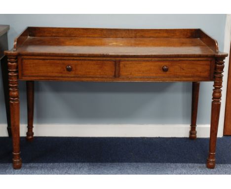 EARLY VICTORIAN POLLARD OAK WRITING OR DRESSING TABLE with three-quarter gallery back, two short frieze drawers each with a k