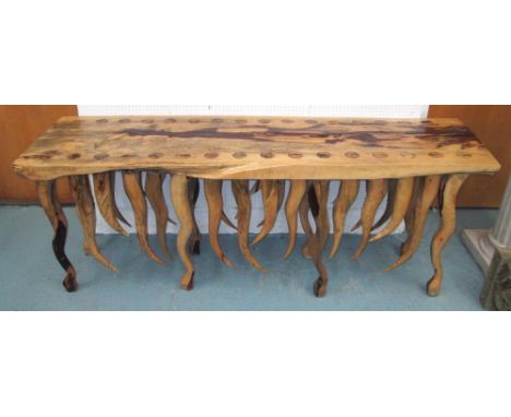 CONSOLE TABLE, carved from a tree trunk with circular supports and an unusual frieze, 206cm x 59cm x 79cm H. 