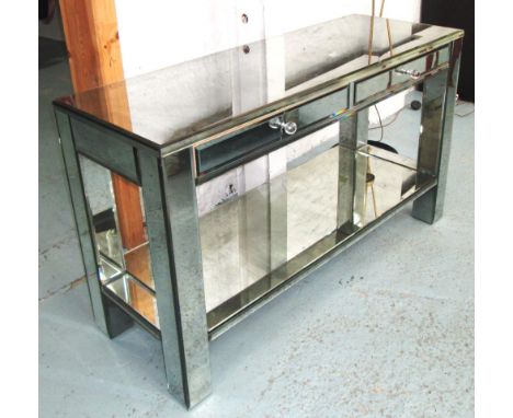 MIRRORED CONSOLE TABLE, with two drawers below and an undertier, 131cm W x 47cm D x 76cm H.
