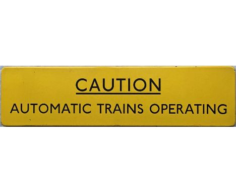 1960s London Underground ENAMEL SIGN 'Caution, Automatic Trains Operating', from the Hainault-Woodford section of the Central