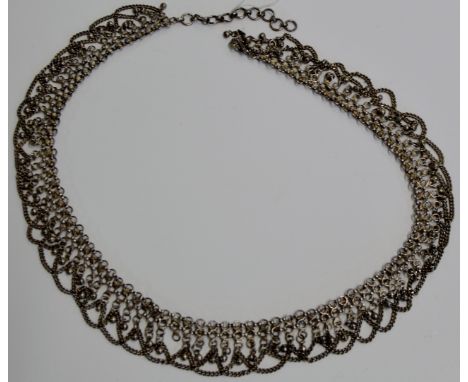 A VINTAGE EASTERN WHITE METAL BELLY DANCER'S BELT     