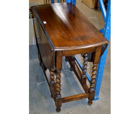 35" OAK GATE LEG TABLE ON TWIST SUPPORTS     