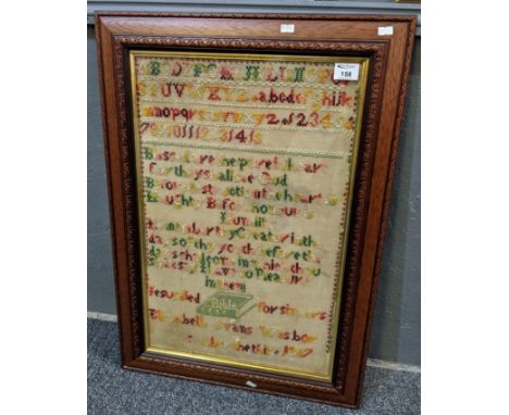 19th Century tapestry sampler by Elizabeth Evans 1887. 64 x 40cm approx. Modern glazed frame. (B.P. 21% + VAT)