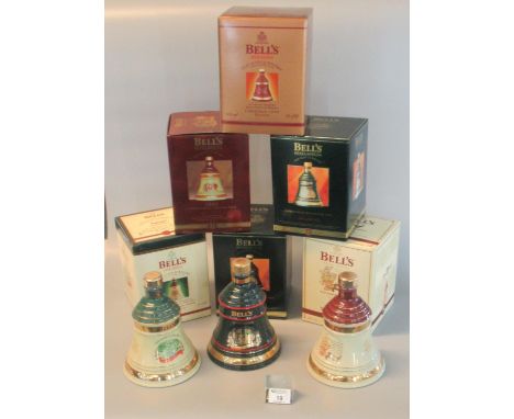 Six Bell's Wade Old Scotch whisky Christmas decanters all in original boxes, dated 1994, 95, 96, 97, 98 and 99. (6)(B.P. 21% 