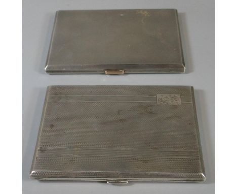 Two silver engine turned cigarette cases of plain form, 12.8 troy ozs approx. (B.P. 21% + VAT) 