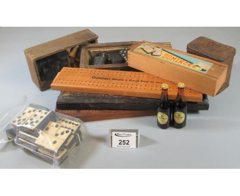 Box of vintage games to include; Guinness and other cribbage boards, chess set, dominoes, Guinness advertising miniature bott