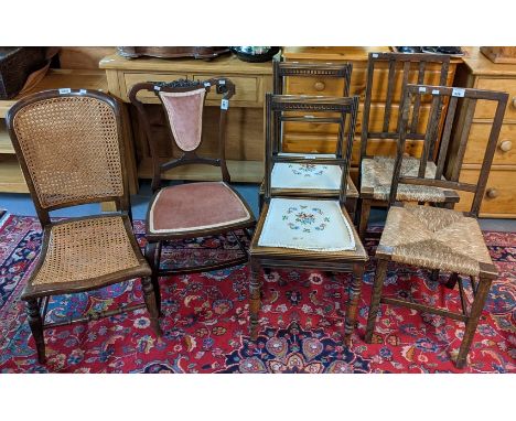 Group of assorted occasional chairs to include; pair of stick back rush seated side chairs, a pair of stained frame bedroom c