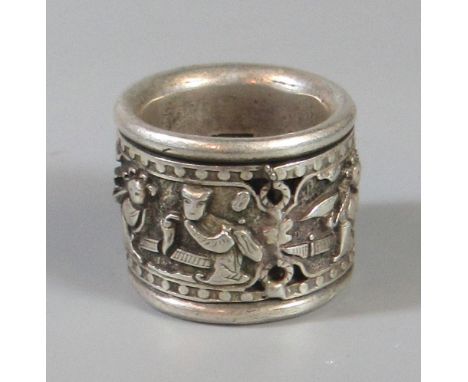 Silver Chinese ring decorated with stylised figures, the interior with impressed character marks. (B.P. 21% + VAT) Some minor